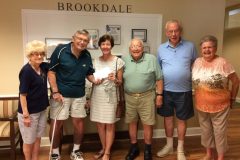 Mary Deur, Venice Concert Band President, accepting donation for scholarships from Brookdale residents.  Sam D'Amico, left of Mary, played clarinet with the Venice Concert Band for many years.