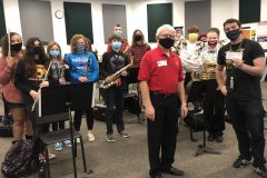 Venice Concert Band gives $,2000 grant to Venice Middle School to purchase music supplies.  Russ Bullis with Director Ian Ackroyd and his band students.  February 2021.